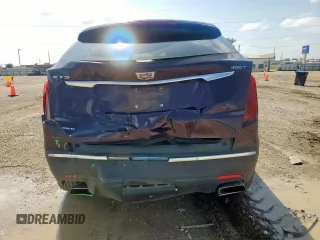 2021 Cadillac XT5 AWD Luxury z VIN 1GYKNBR44MZ162883, wystawiony jako Copart lot #59623725 z przebiegiem 50 006 mil mil oraz Szkoda całkowita • Salvage title. Historia ofert i sprzedaży dostępna na DreamBid. Obrazek 6.