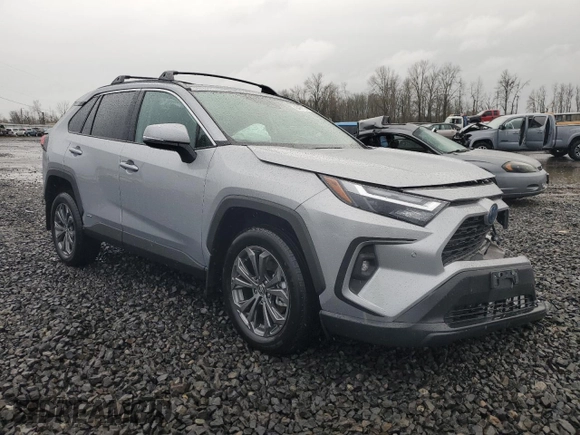 2024 Toyota RAV4 Hybrid XLE Premium with VIN 2T3B6RFV6RW066043, listed as a Copart auction lot 43470115 with 9,454 mi miles and Salvage Title. Bid and sale history available at DreamBid. Image 4.