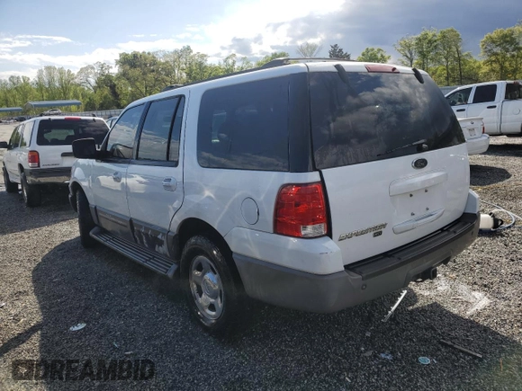 2004 Ford Expedition Special Service with VIN 1FMEU15W04LA49387, listed as a Copart auction lot 52386065 with 322,325 mi miles and Salvage title. Bid and sale history available at DreamBid. Image 2.