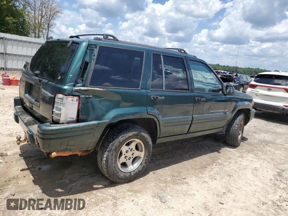 1998 Jeep Grand Cherokee Laredo with VIN 1J4GZ48S5WC289251, listed as a Copart auction lot 63594685 with 156,358 mi miles and Salvage title. Bid and sale history available at DreamBid. Image 3.