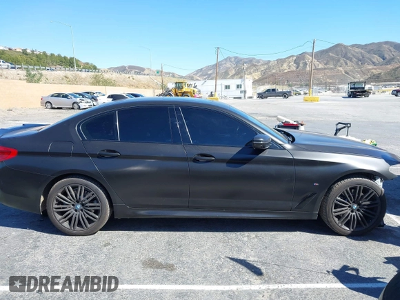 2020 BMW 5 Series 530e with VIN WBAJA9C02LCD31800, listed as a IAAI auction lot 41669765 with 99,024 mi miles and . Bid and sale history available at DreamBid. Image 14.