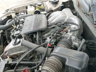 2001 Toyota Camry LE z VIN JT2BF22KX10325072, wystawiony jako IAAI lot #42793346 z przebiegiem 256 289 mil mil oraz . Historia ofert i sprzedaży dostępna na DreamBid. Obrazek 14.