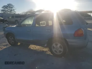 2003 Hyundai Santa Fe GLS with VIN KM8SC13E03U552538, listed as a Copart auction lot 88900865 with 250,847 mi miles and Salvage Title. Bid and sale history available at carsss.com. Image 2.