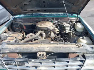 1986 Chevrolet Blazer z VIN 1G8CT18R5G8107497, wystawiony jako IAAI lot #41857104 z przebiegiem 220 287 mil mil oraz . Historia ofert i sprzedaży dostępna na DreamBid. Obrazek 10.