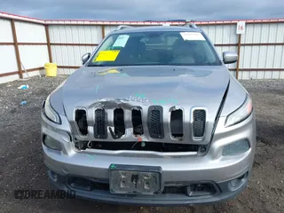2014 Jeep Cherokee Altitude with VIN 1C4PJMCB2EW172275, listed as a IAAI auction lot 41923246 with 197,274 mi miles and . Bid and sale history available at DreamBid. Image 12.