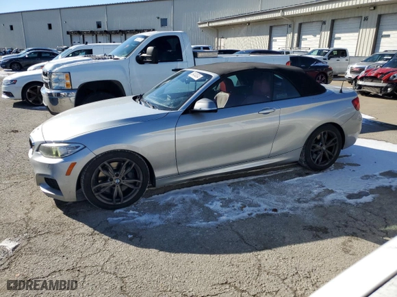 2015 BMW 2 Series M235i with VIN WBA1M1C53FV393443, listed as a Copart auction lot 38404834 with 69,299 mi miles and Clean Title. Bid and sale history available at carsss.com. Image 1.