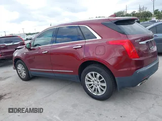 2017 Cadillac XT5 FWD with VIN 1GYKNARS2HZ107587, listed as a IAAI auction lot 41614842 with 124,611 mi miles and . Bid and sale history available at carsss.com. Image 14.