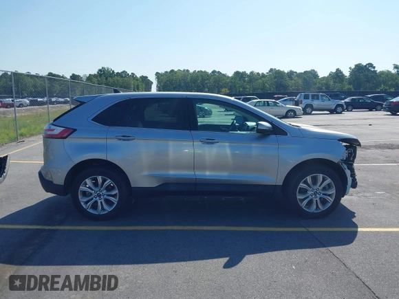 2021 Ford Edge Titanium with VIN 2FMPK3K97MBA15391, listed as a IAAI auction lot 42711656 with 40,723 mi miles and . Bid and sale history available at DreamBid. Image 14.