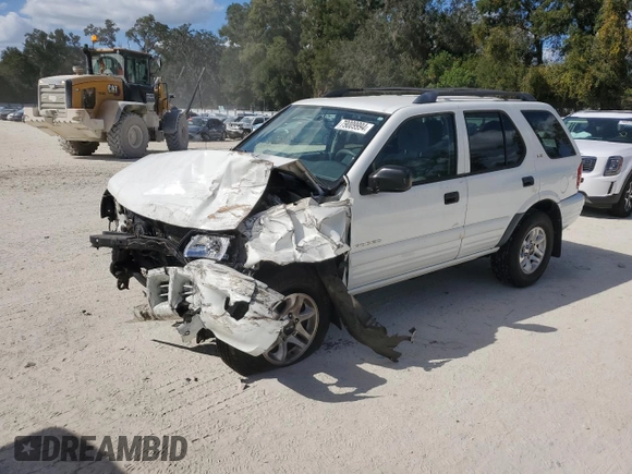 2002 Isuzu Rodeo S with VIN 4S2CK58W124322241, listed as a Copart auction lot 79009994 with 131,793 mi miles and Salvage Title. Bid and sale history available at DreamBid. Image 1.
