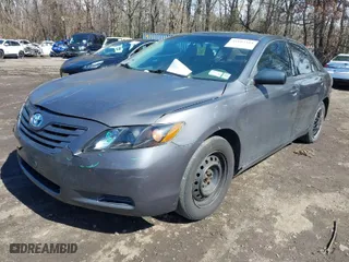 2007 Toyota Camry CE with VIN 4T1BE46KX7U115813, listed as a IAAI auction lot 41803314 with 165,233 mi miles. Bid and sale history available at carsss.com. Image 2.
