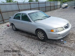 2001 Mazda 626 LX z VIN 1YVGF22C715225501, wystawiony jako IAAI lot #42210842 z przebiegiem 225 546 mil mil oraz . Historia ofert i sprzedaży dostępna na DreamBid. Obrazek 1.