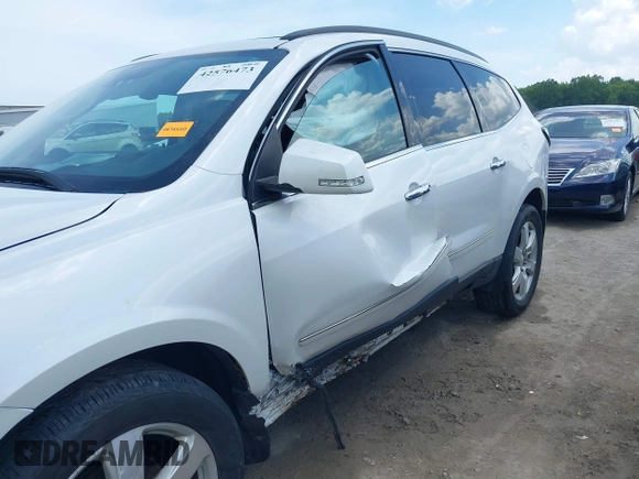 2017 Chevrolet Traverse Premier with VIN 1GNKVJKD8HJ135904, listed as a IAAI auction lot 42576473 with 92,526 mi miles and . Bid and sale history available at DreamBid. Image 6.