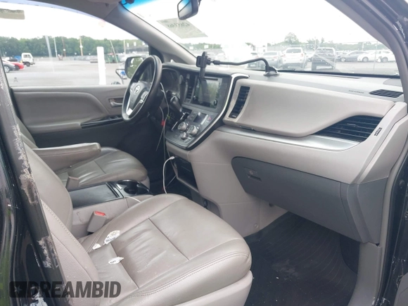 2015 Toyota Sienna LE AAS with VIN 5TDKK3DC9FS618254, listed as a IAAI auction lot 42653368 with 337,308 mi miles and . Bid and sale history available at DreamBid. Image 5.