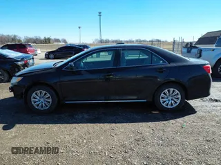 2013 Toyota Camry L with VIN 4T4BF1FK1DR313631, listed as a IAAI auction lot 41738773 with 243,341 mi miles. Bid and sale history available at carsss.com. Image 14.