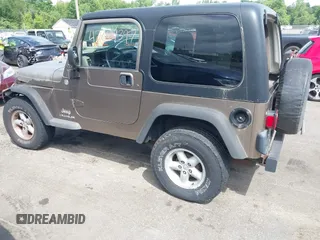 2005 Jeep Wrangler Sport with VIN 1J4FA49SX5P317120, listed as a IAAI auction lot 42677397 with 71,403 mi miles and . Bid and sale history available at DreamBid. Image 14.