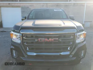 2021 GMC Canyon 4WD AT4 w/Cloth with VIN 1GTG6FEN5M1100096, listed as a Copart auction lot 77535584 with 25,152 mi miles and Salvage Title. Bid and sale history available at carsss.com. Image 5.