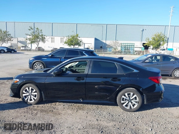 2022 Honda Civic LX z VIN 2HGFE2F29NH580563, wystawiony jako IAAI lot #41861920 z przebiegiem 15 559 mil mil oraz . Historia ofert i sprzedaży dostępna na DreamBid. Obrazek 15.