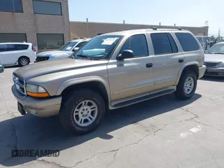 2003 Dodge Durango SLT z VIN 1D4HS48N43F517701, wystawiony jako IAAI lot #42277135 z przebiegiem 135 521 mil mil oraz . Historia ofert i sprzedaży dostępna na DreamBid. Obrazek 2.