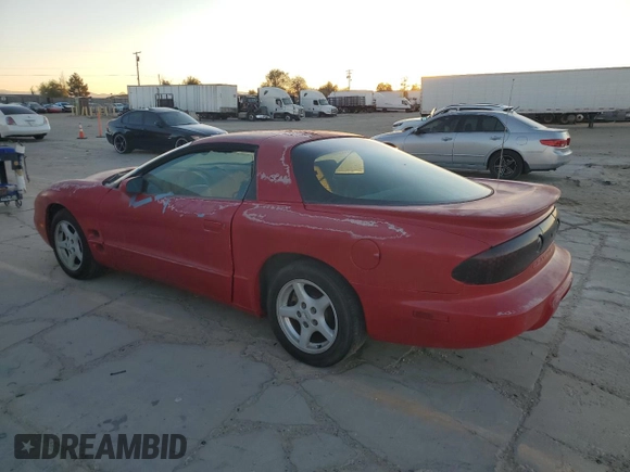 1998 Pontiac Firebird Firebird z VIN 2G2FS22K0W2201603, wystawiony jako Copart lot #79671704 z przebiegiem 309 203 mil mil oraz Czysty tytuł • Clean title. Historia ofert i sprzedaży dostępna na DreamBid. Obrazek 2.