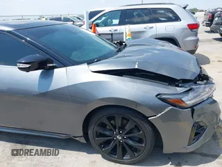 2020 Nissan Maxima SR with VIN 1N4AA6EVXLC383592, listed as a IAAI auction lot 42058071 with 103,014 mi miles and . Bid and sale history available at DreamBid. Image 18.