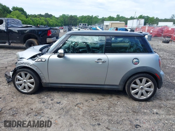2007 MINI Hardtop S with VIN WMWMF73537TL88038, listed as a IAAI auction lot 42200252 with 70,603 mi miles and . Bid and sale history available at DreamBid. Image 15.