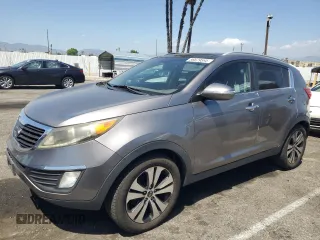 2011 Kia Sportage EX with VIN KNDPC3A26B7144153, listed as a Copart auction lot 56679595 with 257,126 mi miles and Salvage title. Bid and sale history available at DreamBid. Image 1.