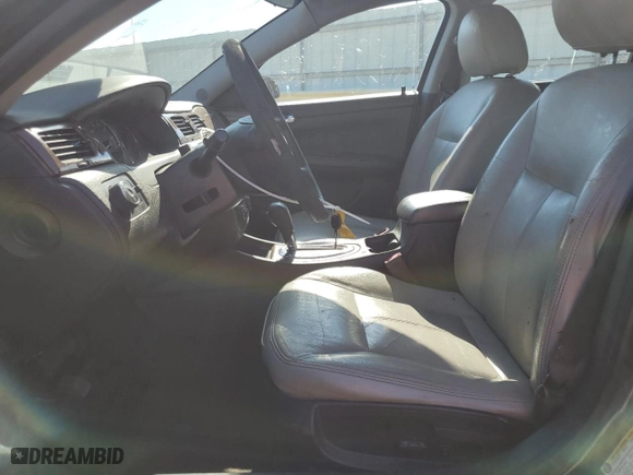2009 Chevrolet Impala 3.5L LT with VIN 2G1WT57K491207913, listed as a Copart auction lot 70985644 with 242,121 mi miles and Salvage Title. Bid and sale history available at carsss.com. Image 7.