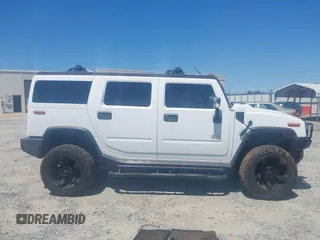 2003 Hummer H2 z VIN 5GRGN23U53H102215, wystawiony jako IAAI lot #42054023 z przebiegiem 222 170 mil mil oraz . Historia ofert i sprzedaży dostępna na DreamBid. Obrazek 13.