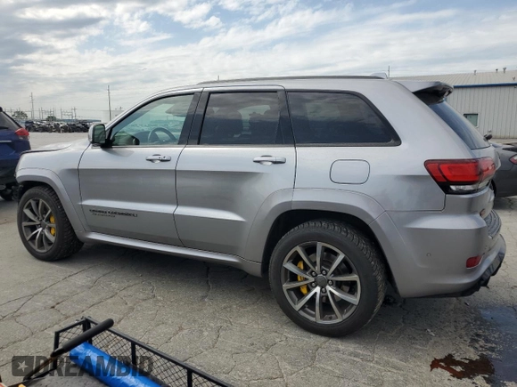 2018 Jeep Grand Cherokee Trackhawk with VIN 1C4RJFN91JC223825, listed as a Copart auction lot 58011465 with 83,177 mi miles and Salvage title. Bid and sale history available at DreamBid. Image 2.