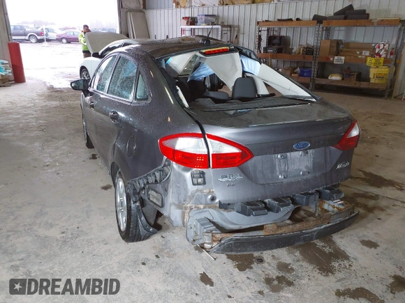 2014 Ford Fiesta SE with VIN 3FADP4BJ9EM117175, listed as a IAAI auction lot 41737432 with 156,141 mi miles. Bid and sale history available at carsss.com. Image 3.