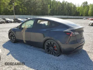 2024 Tesla Model Y Performance z VIN 7SAYGDEF1RF038664, wystawiony jako Copart lot #52583175 z przebiegiem Nie podano mil oraz Szkoda całkowita • Salvage title. Historia ofert i sprzedaży dostępna na DreamBid. Obrazek 2.