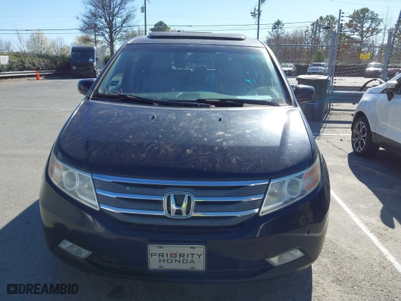 2013 Honda Odyssey Touring with VIN 5FNRL5H99DB076385, listed as a IAAI auction lot 41751504 with 233,875 mi miles. Bid and sale history available at carsss.com. Image 12.