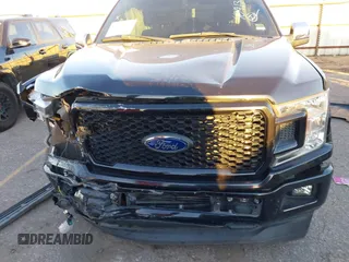 2019 Ford F-150 XL with VIN 1FTEW1CP7KKE76031, listed as a IAAI auction lot 40913377 with 56,578 mi miles and . Bid and sale history available at carsss.com. Image 12.