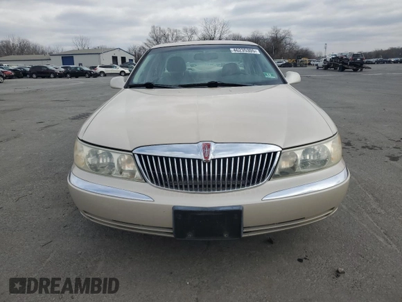 2001 Lincoln Continental z VIN 1LNHM97V71Y711352, wystawiony jako Copart lot #46235305 z przebiegiem 122 786 mil mil oraz Szkoda całkowita • Salvage title. Historia ofert i sprzedaży dostępna na DreamBid. Obrazek 5.