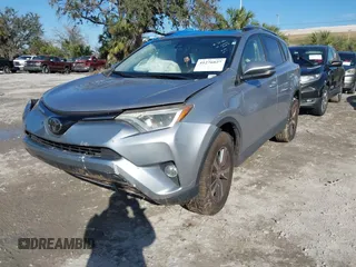 2018 Toyota RAV4 XLE with VIN JTMWFREV7JD125119, listed as a IAAI auction lot 41841021 with 132,659 mi miles and . Bid and sale history available at DreamBid. Image 2.