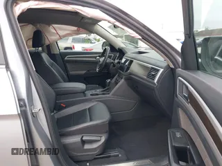 2021 Volkswagen Atlas SE with VIN 1V2JR2CA7MC556268, listed as a IAAI auction lot 41185525 with 73,724 mi miles and . Bid and sale history available at DreamBid. Image 5.