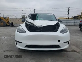 2023 Tesla Model Y Long Range with VIN 7SAYGDEE2PF860135, listed as a Copart auction lot 50380975 with 25,334 mi miles and Salvage Title. Bid and sale history available at DreamBid. Image 5.
