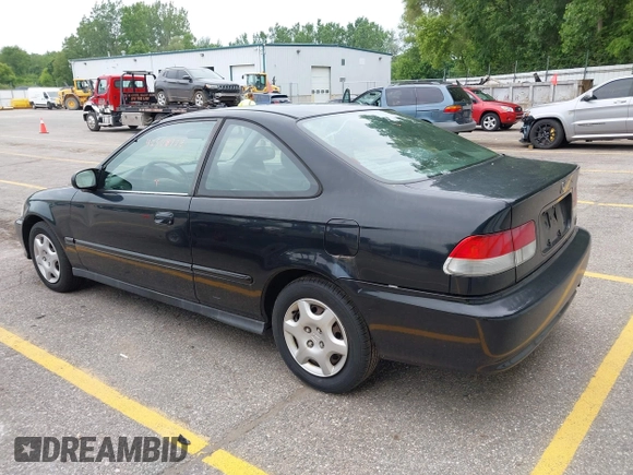 1999 Honda Civic EX z VIN 1HGEJ8241XL068738, wystawiony jako IAAI lot #42568778 z przebiegiem 202 590 mil mil oraz . Historia ofert i sprzedaży dostępna na DreamBid. Obrazek 3.