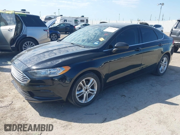 2018 Ford Fusion SE z VIN 3FA6P0H74JR125761, wystawiony jako IAAI lot #41992708 z przebiegiem 102 242 mil mil oraz . Historia ofert i sprzedaży dostępna na DreamBid. Obrazek 2.