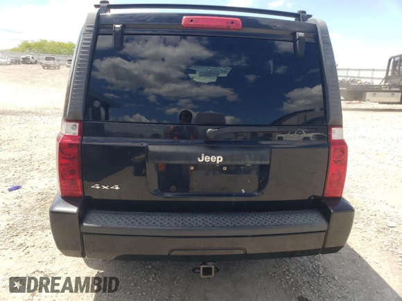 2008 Jeep Commander Sport z VIN 1J8HG48K38C180234, wystawiony jako Copart lot #55959325 z przebiegiem 198 459 mil mil oraz Szkoda całkowita • Salvage title. Historia ofert i sprzedaży dostępna na DreamBid. Obrazek 6.