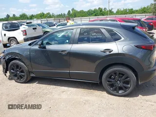 2024 Mazda CX-30 S Select Sport z VIN 3MVDMBBM5RM626265, wystawiony jako IAAI lot #42220770 z przebiegiem 17 895 mil mil oraz . Historia ofert i sprzedaży dostępna na DreamBid. Obrazek 15.