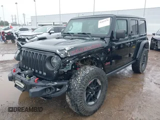 2019 Jeep Wrangler Unlimited Rubicon z VIN 1C4HJXFNXKW511193, wystawiony jako IAAI lot #41452579 z przebiegiem 91 857 mil mil oraz . Historia ofert i sprzedaży dostępna na DreamBid. Obrazek 2.