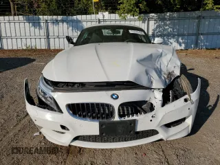 2016 BMW Z4 sDrive28i with VIN WBALL5C5XG5A20925, listed as a Copart auction lot 71274794 with 18,131 mi miles and Salvage Title. Bid and sale history available at carsss.com. Image 5.