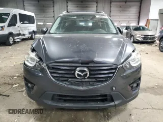 2016 Mazda CX-5 Touring with VIN JM3KE4CY9G0790872, listed as a Copart auction lot 54868385 with 82,569 mi miles and Clean Title. Bid and sale history available at carsss.com. Image 5.