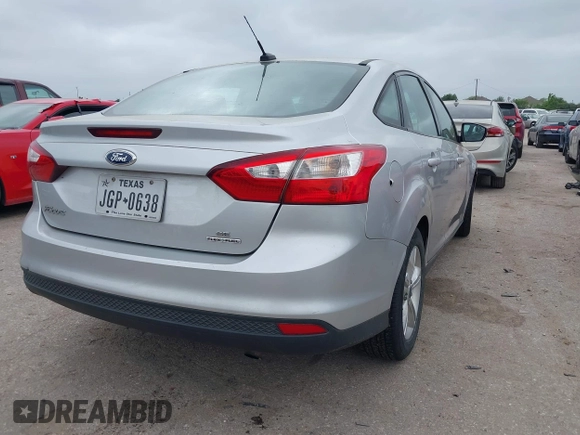 2014 Ford Focus SE with VIN 1FADP3F21EL354774, listed as a IAAI auction lot 41972701 with 115,046 mi miles. Bid and sale history available at carsss.com. Image 4.
