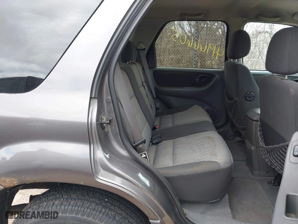 2003 Ford Escape XLT Popular 2 with VIN 1FMYU93103KA39840, listed as a IAAI auction lot 41966605 with 141,321 mi miles. Bid and sale history available at carsss.com. Image 8.