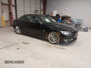 2011 BMW 3 Series 335i with VIN WBADX7C54BE581406, listed as a IAAI auction lot 41263284 with 173,285 mi miles and . Bid and sale history available at carsss.com. Image 1.