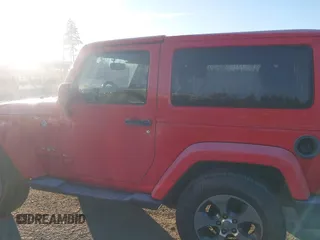 2018 Jeep Wrangler Sahara z VIN 1C4AJWBG2JL936412, wystawiony jako IAAI lot #41381668 z przebiegiem 82 535 mil mil oraz . Historia ofert i sprzedaży dostępna na DreamBid. Obrazek 14.