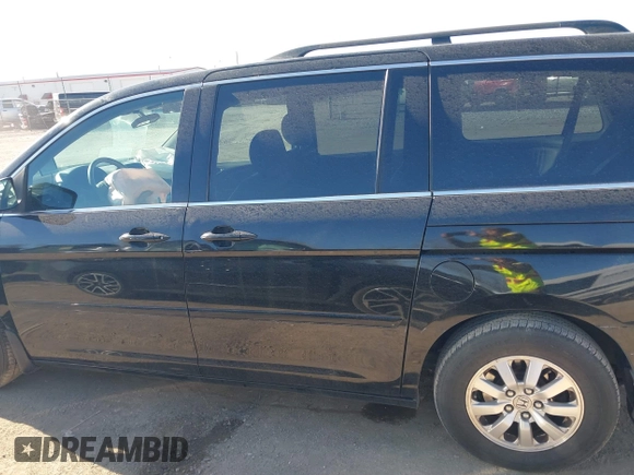 2010 Honda Odyssey EX-L with VIN 5FNRL3H67AB063205, listed as a IAAI auction lot 41996537 with 146,327 mi miles and . Bid and sale history available at DreamBid. Image 14.