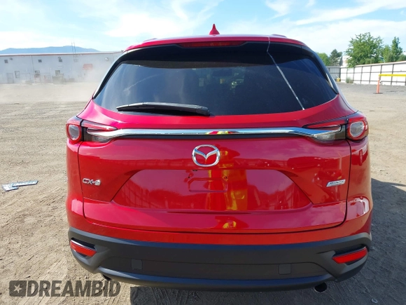 2016 Mazda CX-9 Touring z VIN JM3TCACY9G0122174, wystawiony jako IAAI lot #42613740 z przebiegiem 148 646 mil mil oraz . Historia ofert i sprzedaży dostępna na DreamBid. Obrazek 16.